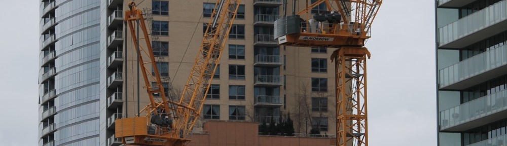Wanda Vista Tower two cranes